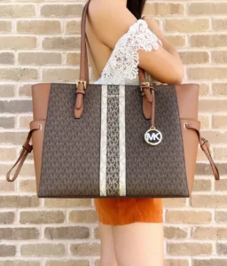 Michael Kors Women s Adjustable Strap Signature Coated Canvas Crossbody Bag Vanilla