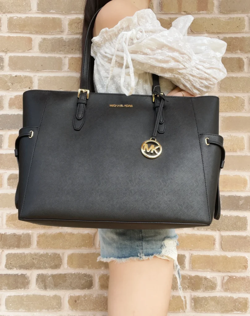 Michael Kors Gilly Large Drawstring Top Zip Tote – Black Saffiano β close-up detail of design and finish